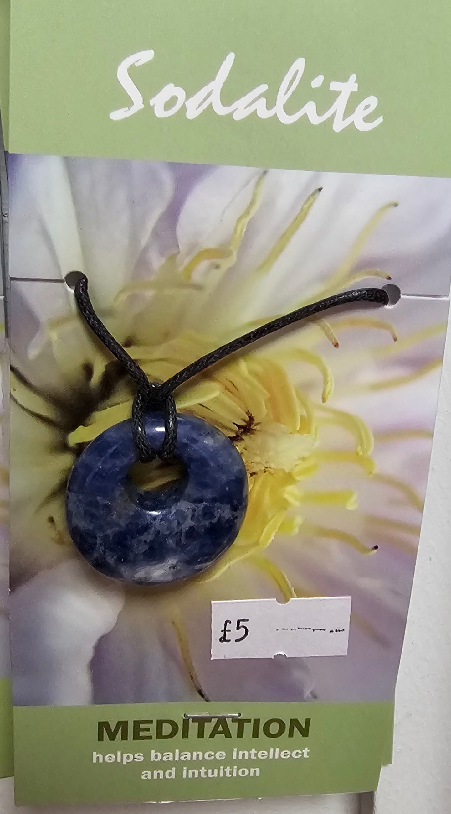 Sodalite pendant on black cord