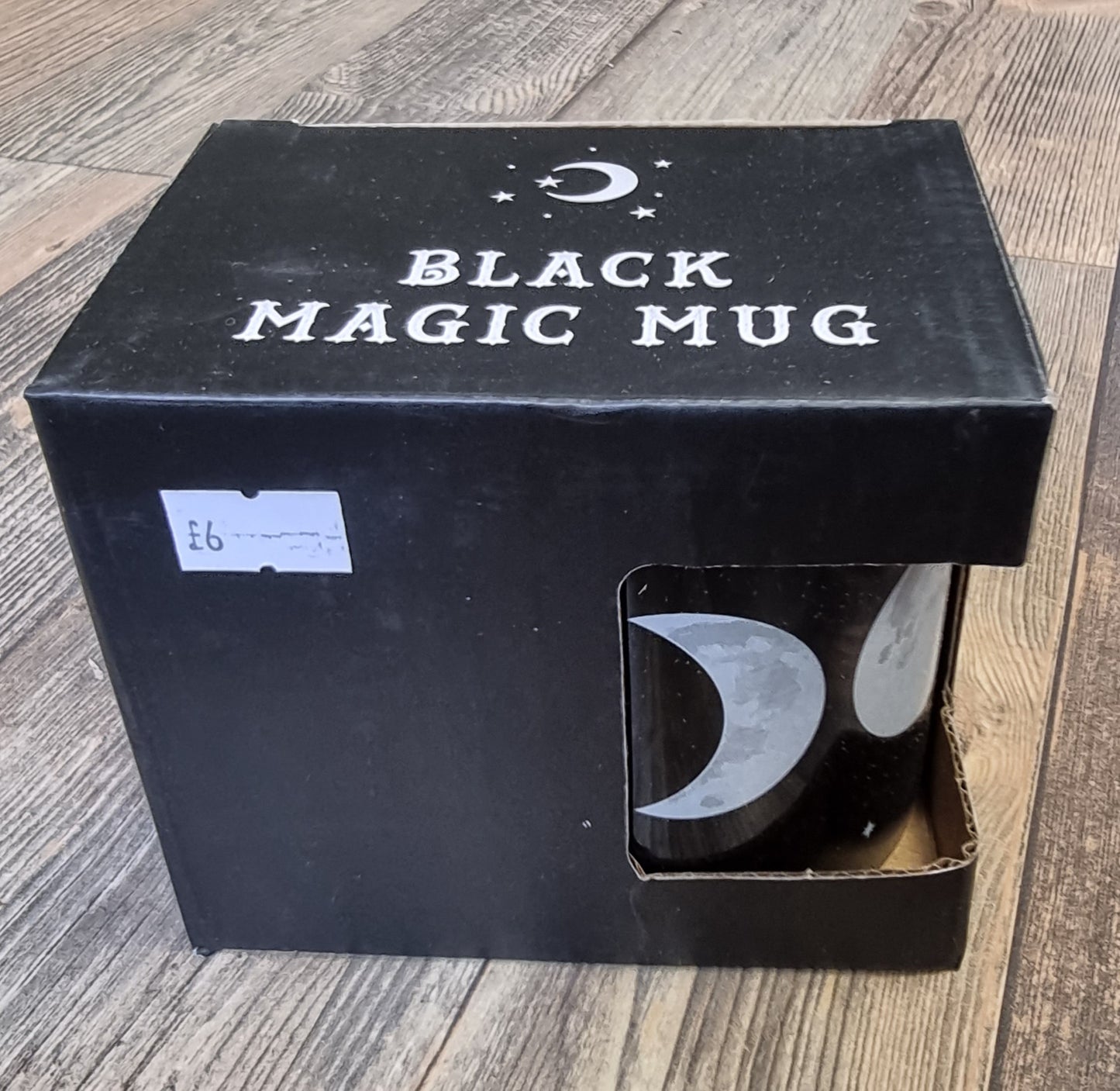 Black magic mug with moon phases