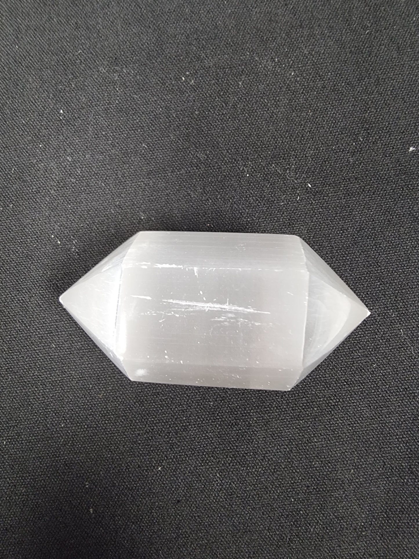 Facetted selenite double point