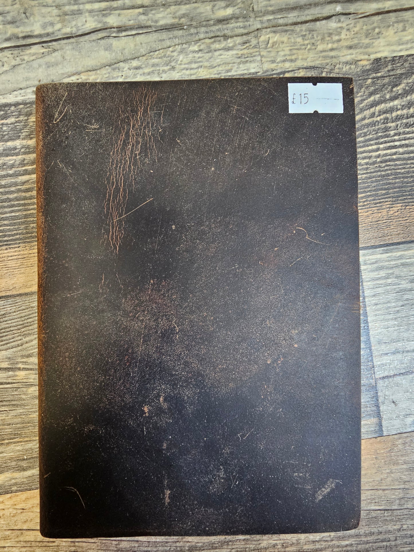 Dark brown leather notebook