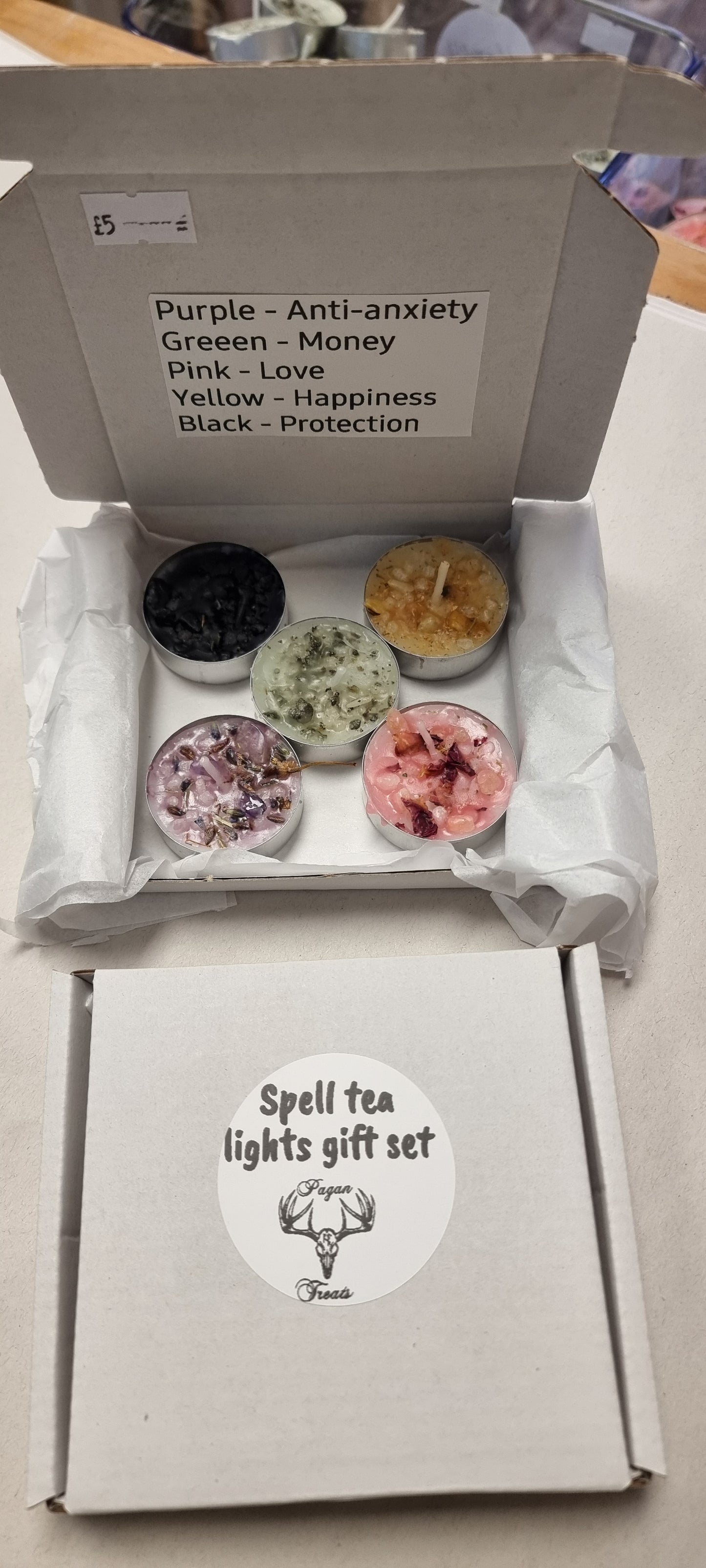 Set of 5 spell tea light candles.